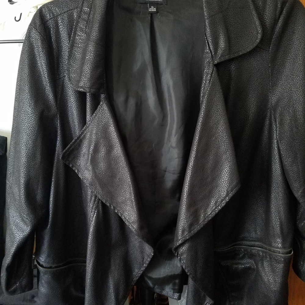 Black Leather Type of Dress Jacket, with Zipper Pockets.